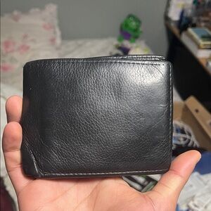 Elegant Black Leather Card Holder good for keeping cash and cards